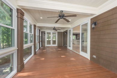 This stunning 4-bedroom, 4-bath home offers a refined living