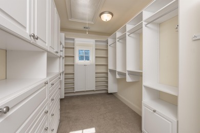 This stunning 4-bedroom, 4-bath home offers a refined living