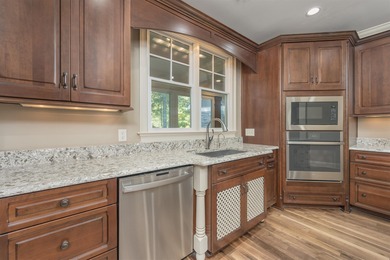 This stunning 4-bedroom, 4-bath home offers a refined living