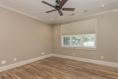 This stunning 4-bedroom, 4-bath home offers a refined living