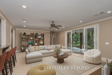 This stunning 4-bedroom, 4-bath home offers a refined living