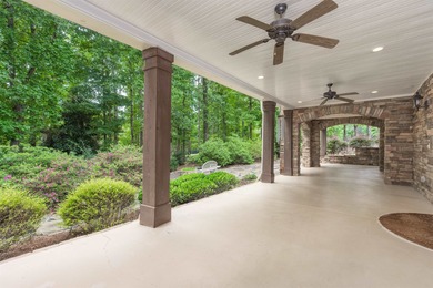 This stunning 4-bedroom, 4-bath home offers a refined living