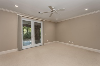 This stunning 4-bedroom, 4-bath home offers a refined living