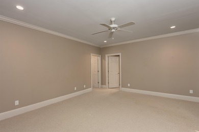 This stunning 4-bedroom, 4-bath home offers a refined living