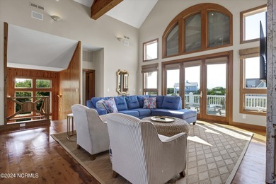 This is a beautifully maintained four-bedroom, five-bathroom