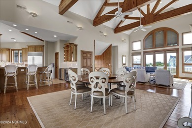 This is a beautifully maintained four-bedroom, five-bathroom