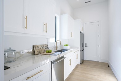 Coming soon--an exceptional new construction  waterfront home by