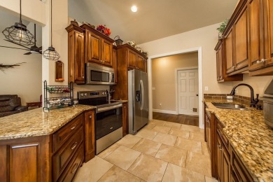 Live the Diamondhead lifestyle at 121 Blue Moon Terrace--a 3 bed