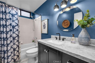 Welcome to this stylish coastal condo, ideally located in the