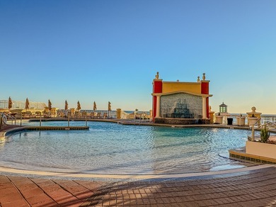 This 2BR/2BA + bunk room condo at Emerald Grande with stunning