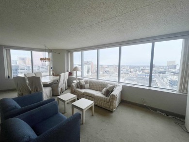 Spacious 1-bedroom high-rise condo with large windows in both