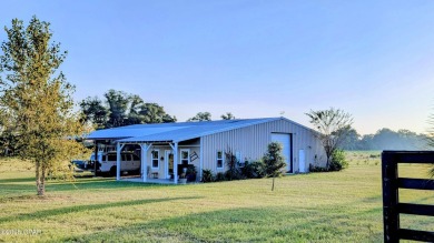 Custom-designed and built Country Estate on 26 acres. This newer