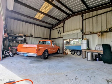 Custom-designed and built Country Estate on 26 acres. This newer