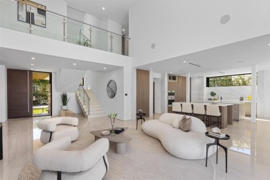 Luxurious three story waterfront estate newly constructed in