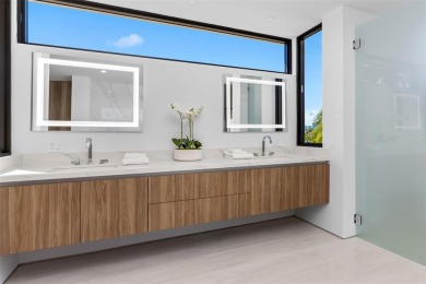 Luxurious three story waterfront estate newly constructed in