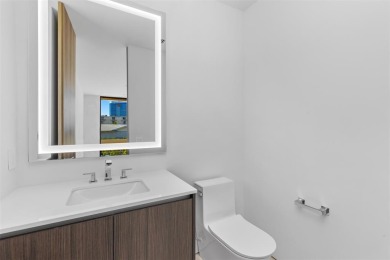 Luxurious three story waterfront estate newly constructed in