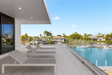 Luxurious three story waterfront estate newly constructed in