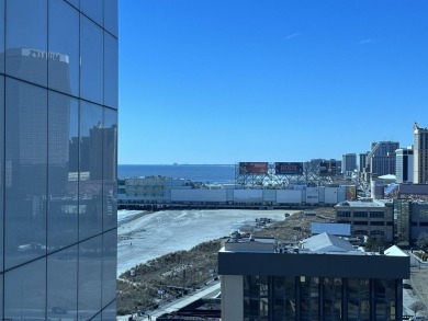 Bright and airy 1-bedroom condo in a high-rise, featuring