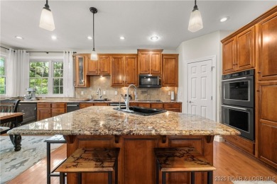 Immaculate home in a highly sought-after subdivision with lake