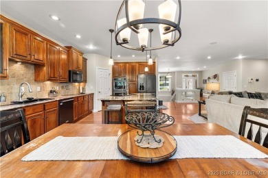 Immaculate home in a highly sought-after subdivision with lake