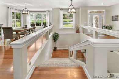 Immaculate home in a highly sought-after subdivision with lake