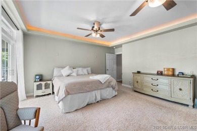 Immaculate home in a highly sought-after subdivision with lake