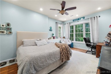 Immaculate home in a highly sought-after subdivision with lake