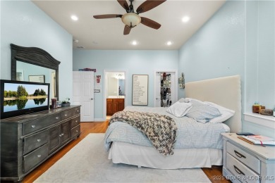 Immaculate home in a highly sought-after subdivision with lake