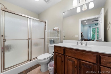 Immaculate home in a highly sought-after subdivision with lake