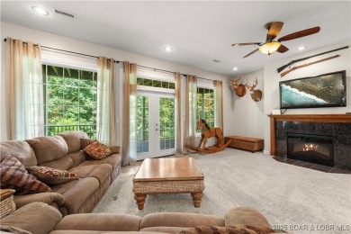 Immaculate home in a highly sought-after subdivision with lake