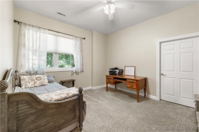 Immaculate home in a highly sought-after subdivision with lake