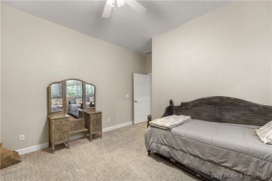 Immaculate home in a highly sought-after subdivision with lake