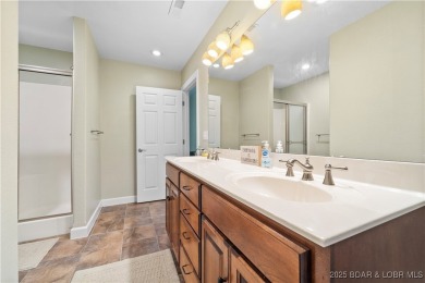 Immaculate home in a highly sought-after subdivision with lake