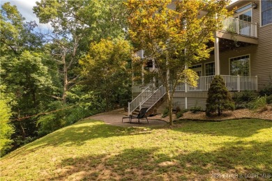 Immaculate home in a highly sought-after subdivision with lake