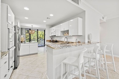 Seaside Retreat! This end-unit has been beautifully renovated &