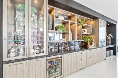 First time on the market, this 4 bed/5 bath penthouse spans 4