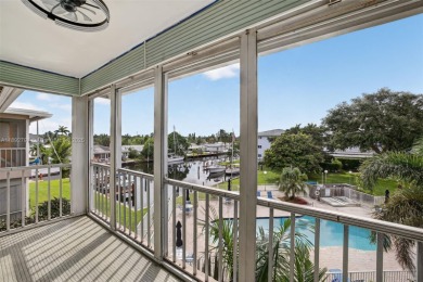 Top-floor unit w/ screened patio over peaceful water & pool