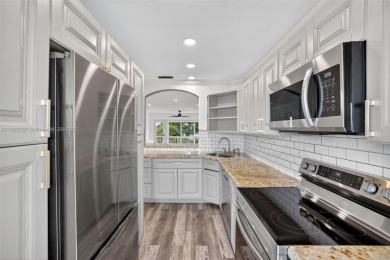 Top-floor unit w/ screened patio over peaceful water & pool