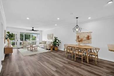 Top-floor unit w/ screened patio over peaceful water & pool