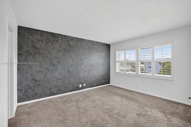 Top-floor unit w/ screened patio over peaceful water & pool