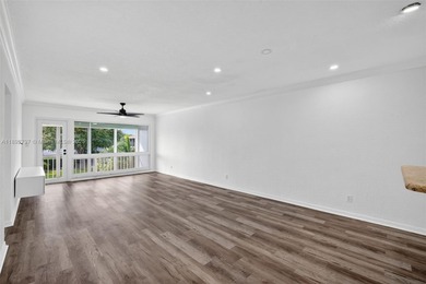 Top-floor unit w/ screened patio over peaceful water & pool