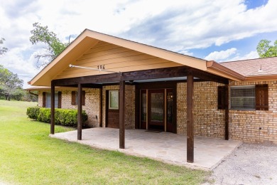 Experience the endless potential of this stunning lakefront