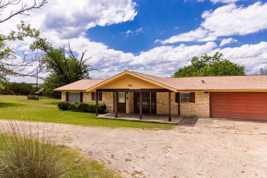 Experience the endless potential of this stunning lakefront