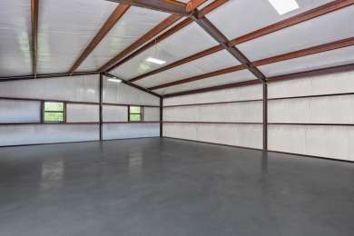 Experience the endless potential of this stunning lakefront