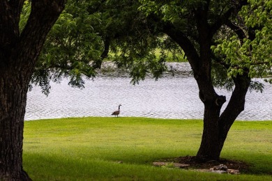 Experience the endless potential of this stunning lakefront