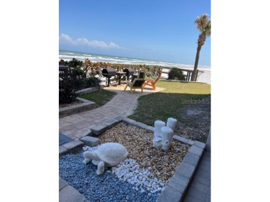 Sixth floor oceanfront unit on a quiet no-drive stretch of Ponce