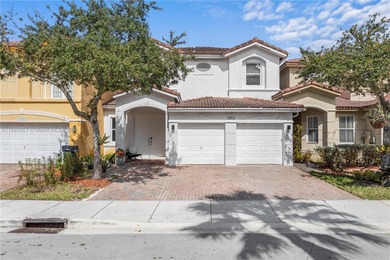 Stunning 3 beds/2.5 bath Coach Home in Prime Location. Nestled