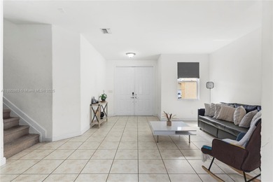 Stunning 3 beds/2.5 bath Coach Home in Prime Location. Nestled