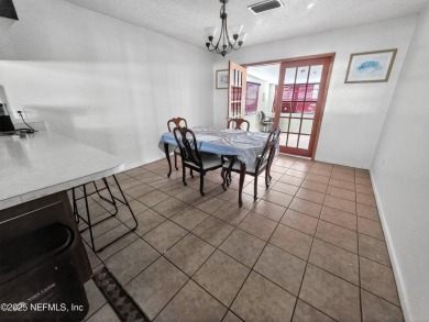Welcome to this charming 3 bed, 2 bath brick POOL home sitting