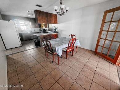 Welcome to this charming 3 bed, 2 bath brick POOL home sitting